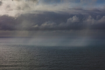 Clearing storm over vast ocean