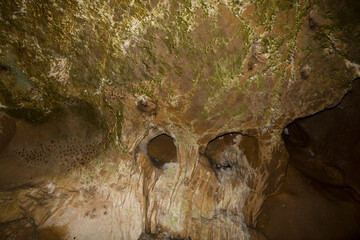 Speleology. The Bacho Kiro cave, Dryanovo, Bulgaria. Stalactite, and stalagmite speleothem...