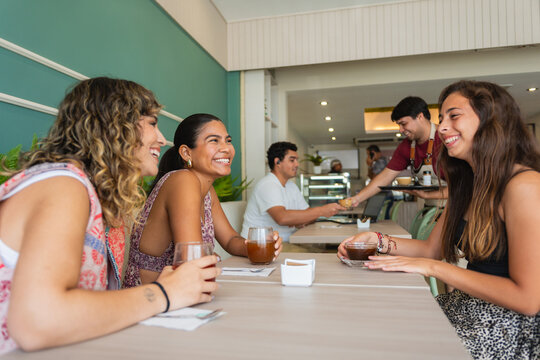 Happy Friends in a Restaurant 