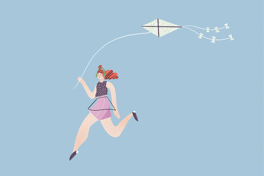 Careless female in headphones running with flying kite in hand
