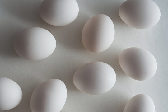 White Eggs on Bright Surface in Soft Lighting