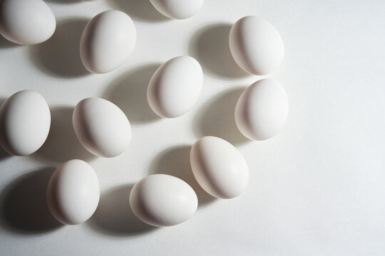 White Eggs on Bright Surface in Soft Lighting