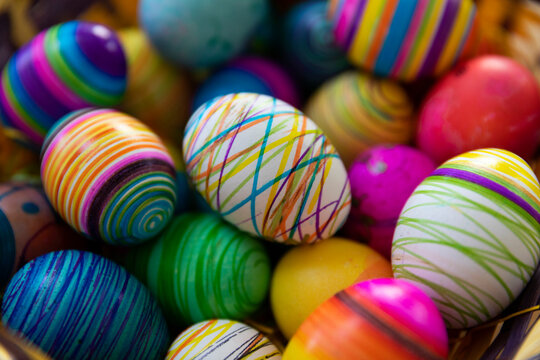 Decorative Easter Eggs in Basket for Holiday Celebration 