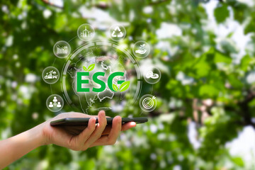ESG environmental social governance investment business concept, Women use smartphones show earth...