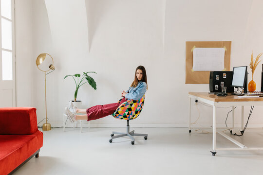 Female intern generation Z having fun in the office