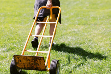 Teens volunteering with garbage bins