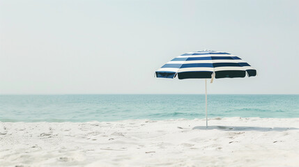 Retro vintage navy white stripe beach umbrella French parasol on sand sunny summer beach sea waves cloud sky earthy natural color vacation relaxation seaside coast resort ocean vibes summer holiday 