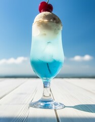 さくらんぼが乗った青いクリームソーダ