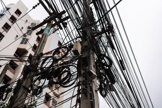 Electrical cables and communication wires.