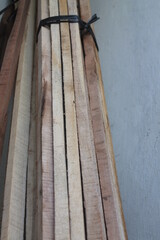 Wooden groups tied with rafia ropes

