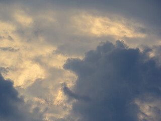 Fototapeta na wymiar Rising thunderstorm with dark clouds in the sky