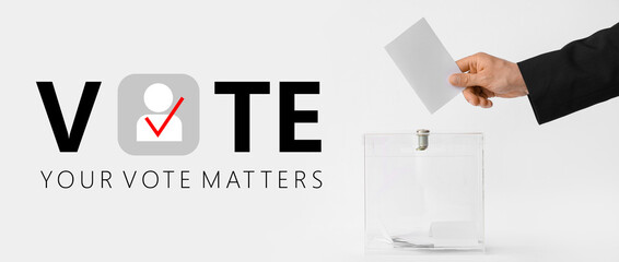 Voting man near ballot box on table against white background