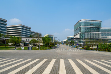 Empty paths and modern office buildings in science and technology parks, Chongqing, China.