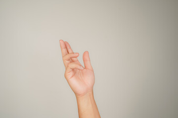 Asian man hand gesture isolated on white background