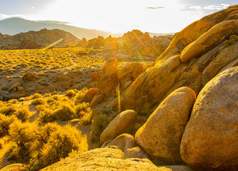 Sunrise Over The Inyo Mountains and Eroded Rock Formations, Alabama Hills National Scenic Area, California, USA