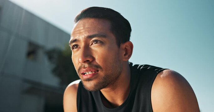 Breathing, exercise and man outdoor in city for fitness, break and happy energy in morning from cardio. Runner, workout and healthy person relax after training with pride and positive mindset