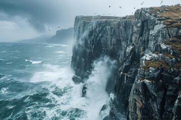 A rocky cliff with crashing waves and a stormy sky