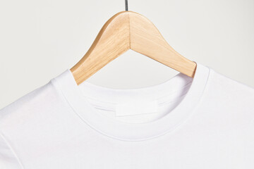 White t-shirt with a tag png mockup