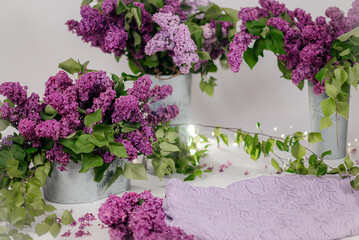 A beautiful composition of lilac bouquets on a light background, creating a soft and elegant atmosphere
