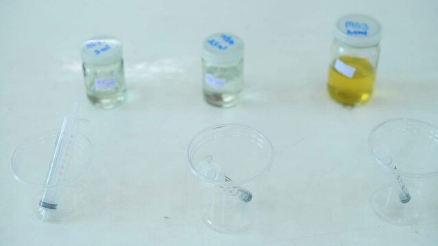 Experimenting with chemicals in the lab.