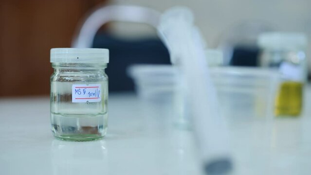 Experimenting with chemicals in the lab.