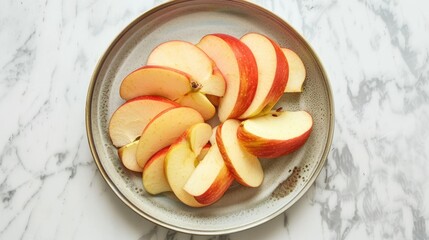 Crispy apple slices arranged artfully on a plate