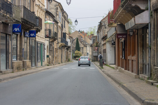 France, 07 April 2024: Historic Town Street with Modern Car.
