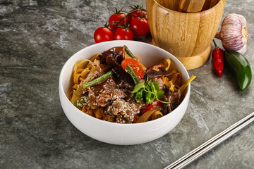 Asian wok with noodle, vegetables and beef