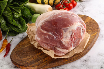 Uncooked raw pork knuckle with spices