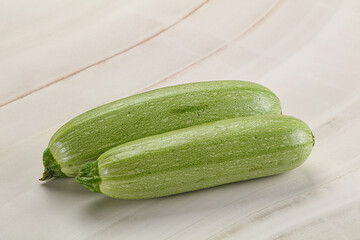 Raw green ripe zucchini vegetable