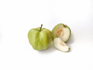 Green guava or in Indonesian crystal guava, in Whole and split form, isolated on white background