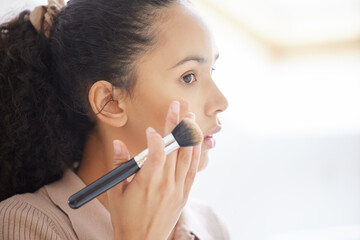 Face, beauty and woman with makeup brush in home for skincare, health or treatment in bathroom....