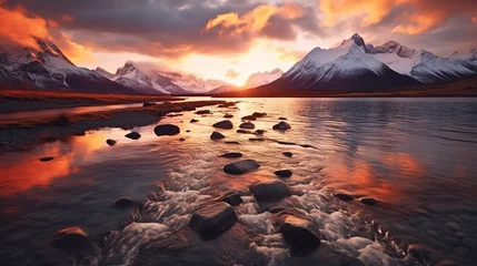 Foto op Aluminium A beautiful sunset with mountains in the background and a lake with glacier water in the foreground Generative AI © KRIS