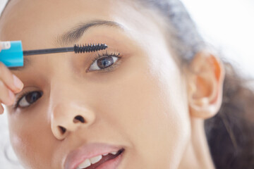 Portrait, makeup and woman with mascara brush in home for skincare, beauty or treatment in...