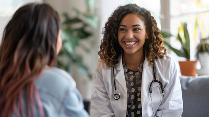 Friendly doctor smiling during a patient consultation