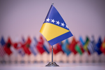 Bosnia and Herzegovina flag with a gray and clean background.