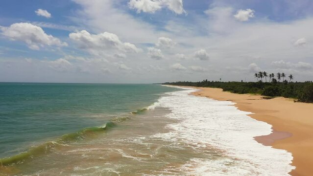 Tropical sandy beach and blue sea. Lankavatara, Sri Lanka.