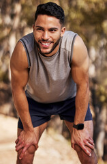 Runner, man and break with smile for fitness in outdoors for wellness with training or exercise in...