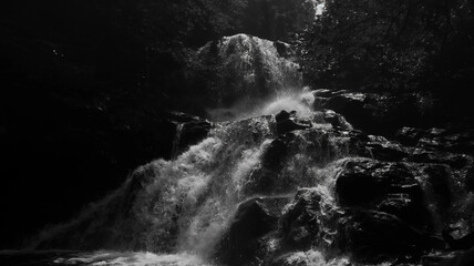 Black and white photo of the waterfall. Landscapes photography. 