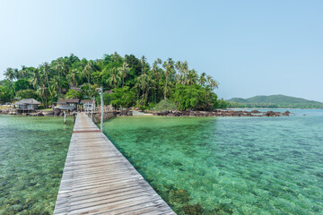 Wooden bridge on sea for entry to the beautiful island. - 789927269