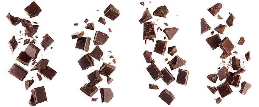 Set of pieces of dark chocolate falling close up on a white background