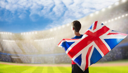 UK team supporter on stadium. British fans. - 789930815