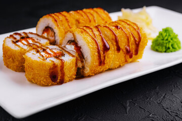 Delicious sushi roll platter on elegant white dish