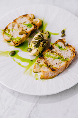 Gourmet toast with avocado and capers