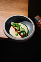 Gourmet fine dining dish in elegant presentation