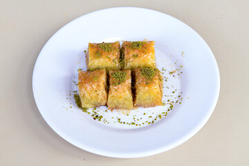 Turkish Dessert Sobiyet  Baklava, mussels baklava and classic baklava with Pistachio . Cevizli, Fistikli Baklava, top view.