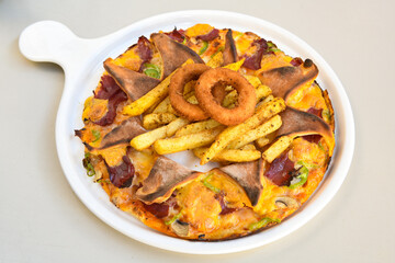 Traditional Turkish cuisine. Pizza, pita, pidesi, sucuk, hummus, kebab. Many dishes on the table. Serving dishes in restaurant. Margherita,  mix, formaggi, veggie karisik pizza. Top view, flat lay