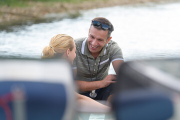 coach talking to lady performing watersports