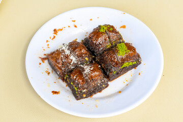 Turkish Dessert Sobiyet  Baklava, mussels baklava and classic baklava with Pistachio . Cevizli, Fistikli Baklava, top view.