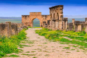 Volubilis, Morocco. The Arch of Caracalla on the city's main street, the Decumanus Maximus.